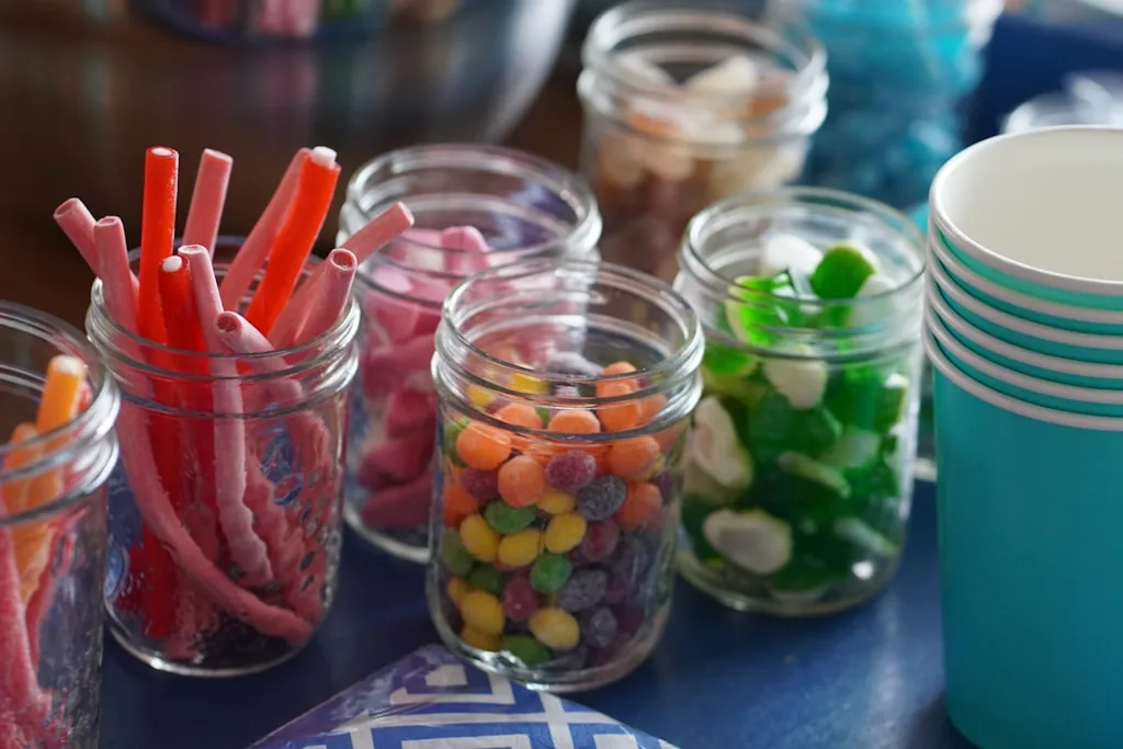 Jars filled with candy on a table