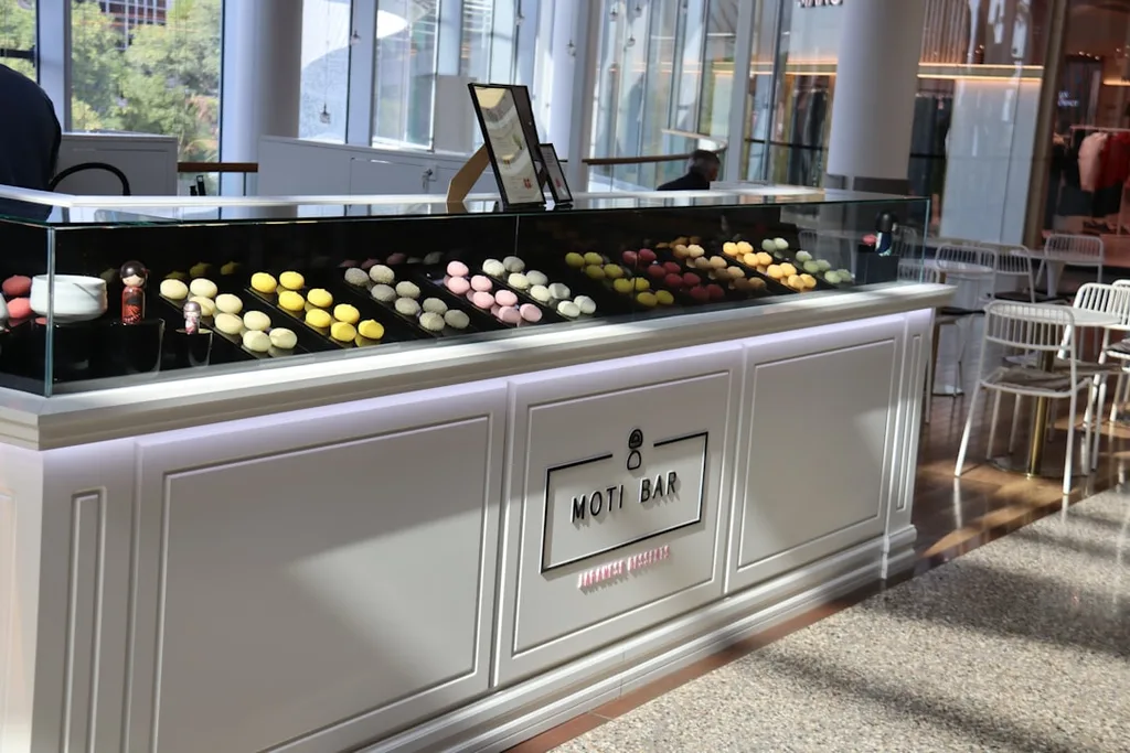 Colourful mochi dessert display case