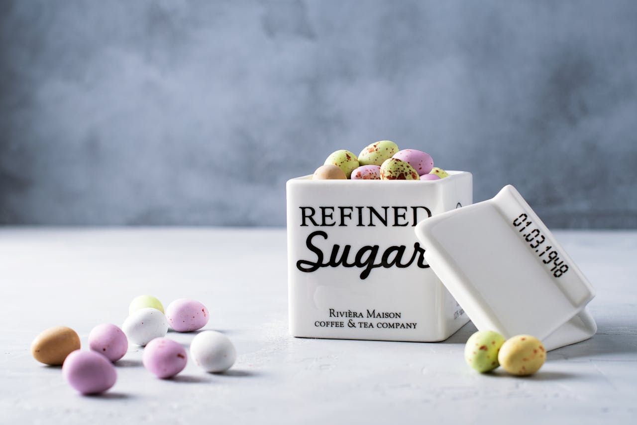Home Easter-themed candies in a refined sugar jar, perfect for festive decor.