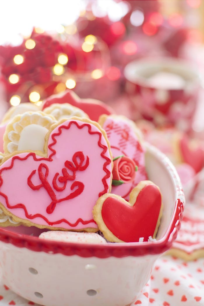 About Heart-shaped cookies with love decor in a Valentine's setting. Perfect for romantic themes.